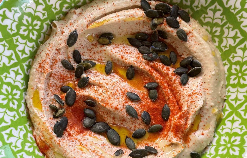 Hommus snack with pepita seeds and paprika